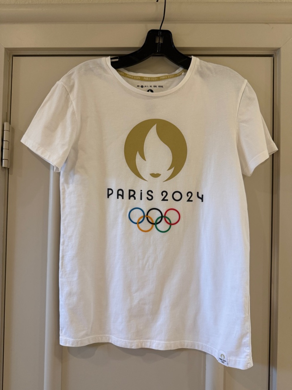 Aris White Tee with Gold 'PARIS 2024' Neck Tape